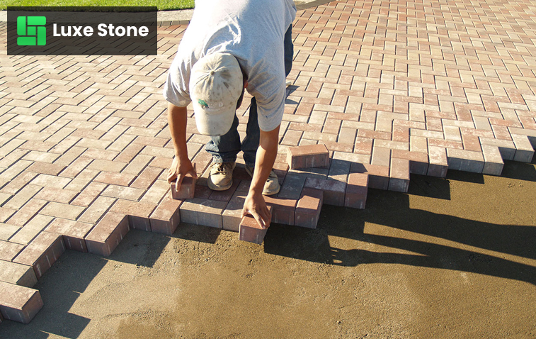 Laying Brick pavers and compacting surface